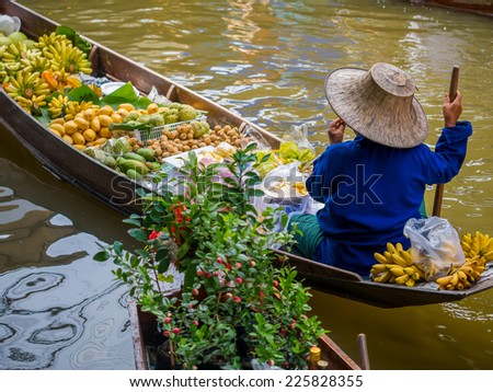 Damnoen Saduak floating market in Ratchaburi near Bangkok, Thailand Royalty-Free Stock Photo #225828355