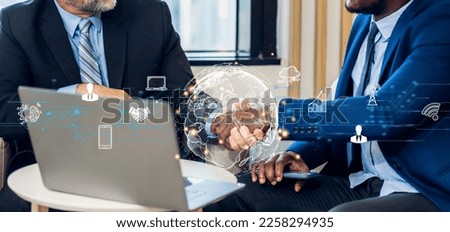 Image two business partners in elegant suit successful handshake together with technology link internet connection network earth global world map at office.Business success and technology	