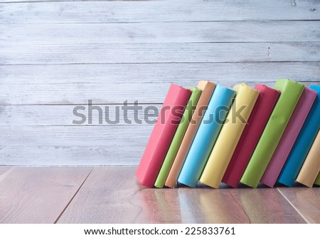 Books on a wooden  background.