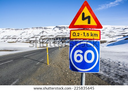 Mountain road with traffic signs