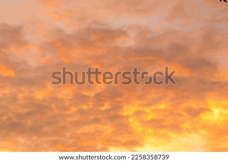 Orange and Yellow Clouds in the Cinematic Beautiful Sky	 Royalty-Free Stock Photo #2258358739