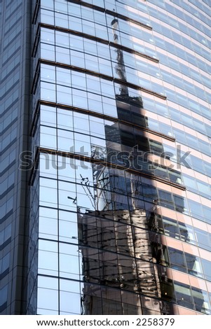 New York City Tower Building Reflection in Glass Building