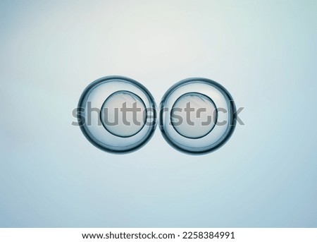 Cells division process, Cell divides into two cells Royalty-Free Stock Photo #2258384991