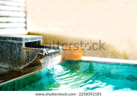Japanese Hot Springs Onsen Natural Bath,  In the natural healing bamboo room, When it's snowing outside, selective focus, soft focus.
 Royalty-Free Stock Photo #2258392181