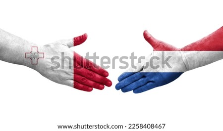 Handshake between Malta and Netherlands flags painted on hands, isolated transparent image.
