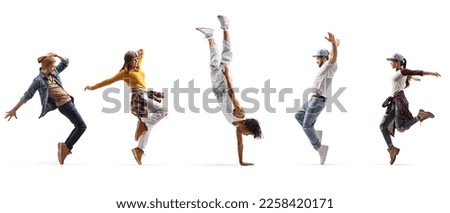 African american guy performing a handstand and other people dancing isolated on white background