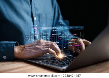 Analyst working in Business Analytics and Data Management System to make report with KPI and metrics connected to database. Corporate strategy for finance, operations, sales, marketing. Royalty-Free Stock Photo #2258424457