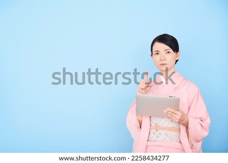 woman wearing Japanese traditional national costume “kimono"