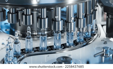 Close-up of Medical Ampoule Production Line at Modern Modern Pharmaceutical Factory. Medication Manufacturing Process. Royalty-Free Stock Photo #2258437685