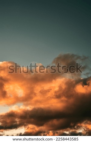 Colorful cloudy sky after rain with black clouds after rain, Sky. Natural background. Evening summer cloudscape