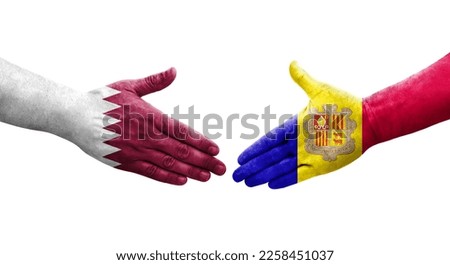 Handshake between Andorra and Qatar flags painted on hands, isolated transparent image.