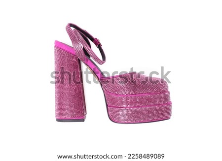 Fashionable punk square toe ankle strap pump isolated on white, top view. Shiny party platform high heeled shoe Royalty-Free Stock Photo #2258489089