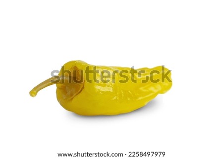 Pickled yellow pepper, pepperoncini or friggitelli isolated on white background. Hot pepper marinated, brined. Traditional Italian and greek cuisine, ingredient for salad, pasta, sauce. Royalty-Free Stock Photo #2258497979