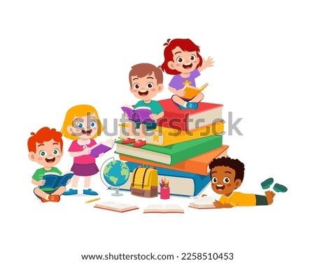 little kid reading book with friend together Royalty-Free Stock Photo #2258510453