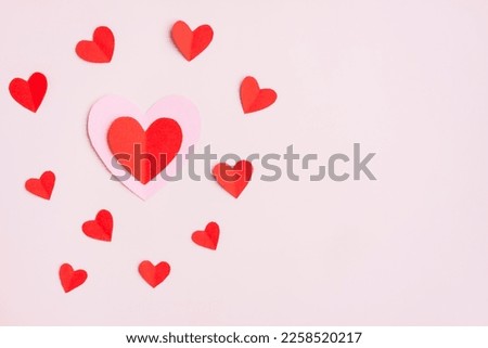 Red and Pink Paper Hearts on pink background, Heart shape papercut , Happy Valentine's day Royalty-Free Stock Photo #2258520217