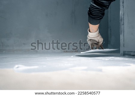 waterproofing of the bathroom floor in a new building Royalty-Free Stock Photo #2258540577