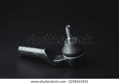 Close-up of Tie Rod or Ball Joints. New spare part for steering tie rod. Trade in spare parts or car service. Selective focus Royalty-Free Stock Photo #2258563431