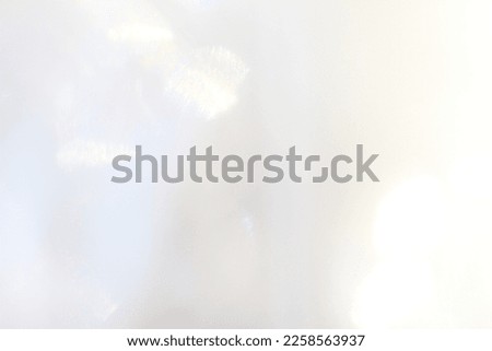 Abstract background - light flashes on grey background.