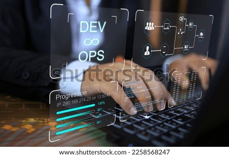Businessman using computer to work in DEV and OPS to improve organizational system and make work more efficientcy. Royalty-Free Stock Photo #2258568247