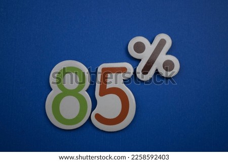 Colorfully written 85 percent on a blue background. Royalty-Free Stock Photo #2258592403