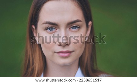 Portrait of an 18-year-old girl. Close-up of her face.