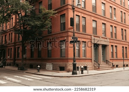 Lantern and fire hydrants on urban street in New York City Royalty-Free Stock Photo #2258682319