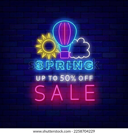 Spring sale neon label. Hot air balloon, sun and cloud. Season special offer. Shopping announcement on brick wall. Shiny greeting card. Glowing banner. Vector stock illustration