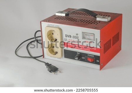 Voltage regulator with wires isolated on a white background.