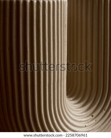 Photo of the background of beige embossed, beige background, Clay dishes utensils