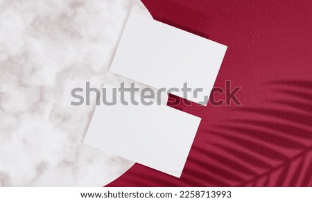 Business card mockup on Viva Magenta toned colour background with leaves shadow. Blank paper cards with copy space on round marble podium. Creative minimal design. Top view banner with overlays leaf