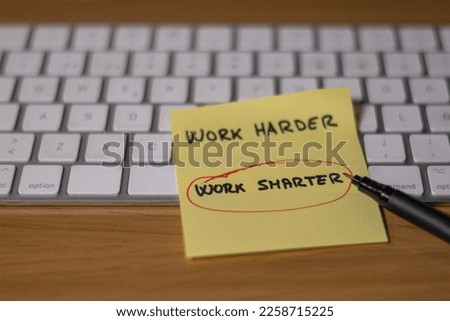Note On A Computer Keyboard That Reads: Work Smarter