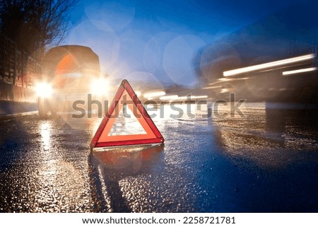 Car Breakdown on the roadside, 	breakdown triangle Royalty-Free Stock Photo #2258721781