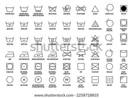 Laundry vector icons set. Care clothes instructions on labels, machine or hand washing signs collection. Water, ironing and drying temperature symbols collection, textile and fabric types Royalty-Free Stock Photo #2258728835