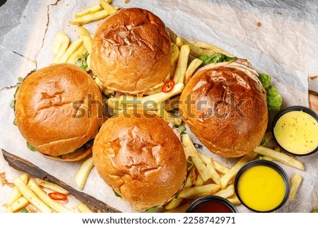 burger menu, burgers, french fries  and dipping sauces