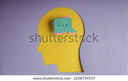 Conceptual Photo. Speak Your Mind, Voices, Saying with Smart Brain Concepts. Paper Cut as Speech Bubble Heart Lay on Human Head Royalty-Free Stock Photo #2258754557