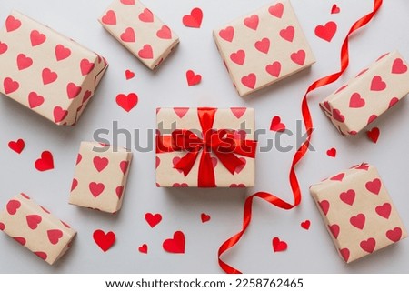 Creative gift box with decorations for the holiday, top view. Birthday and valentine present.