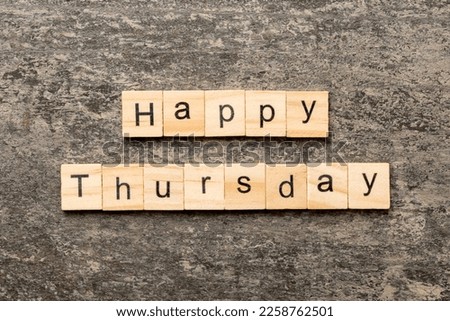 Happy thursday word written on wood block. Happy thursday text on cement table for your desing, concept.