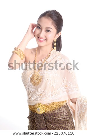 Portrait of Thai young lady in an ancient Thailand dance with isolated background.