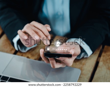 Two steps authentication (2FA) concept. 2023, Shield and asterisk icons code showing on smart phone while using computer for validate password, Identity verification, cyber security technology. Royalty-Free Stock Photo #2258792229