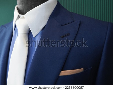 Close up of suit bespoke tailor and detail Royalty-Free Stock Photo #2258800057