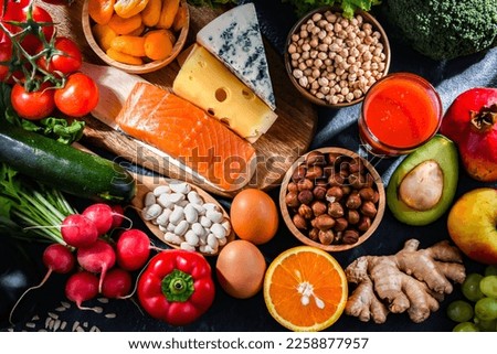Food products representing the nutritarian diet which may improve overall health status Royalty-Free Stock Photo #2258877957