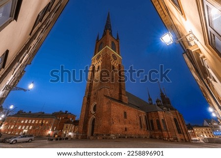 Stockholm, Sweden. Low angle view of Riddarholmen Church at night, place of burial of Swedish Royal Family