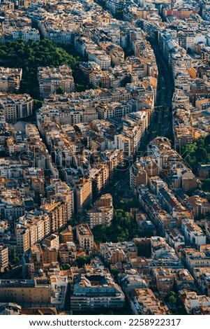 Aerial view of Ronda del Mig of the city and with the typical buildings of Barcelona cityscape from helicopter. top view. Neighborhood. Royalty-Free Stock Photo #2258922317