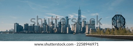 skyline with skyscrapers of Manhattan near Hudson river in New York City, banner