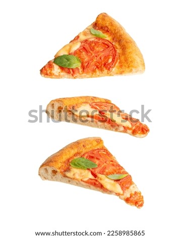 Pieces of falling pizza on a white background. Pizza margherita. Levitation. Fast food. Royalty-Free Stock Photo #2258985865