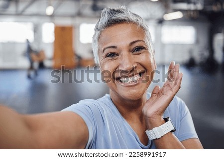 Selfie, gym and fitness senior woman taking picture after exercise, workout or training with a smile. Elderly, old and portrait of a fit female happy for wellness, health and update social media