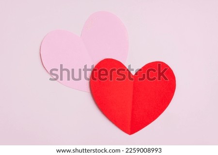 Red and Pink Paper Hearts on pink background, Heart shape papercut, Happy Valentine's day Royalty-Free Stock Photo #2259008993
