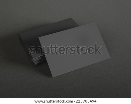 Black business cards on textile background