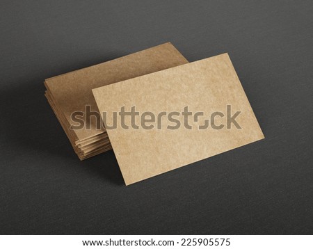 Cardboard business cards on dark background