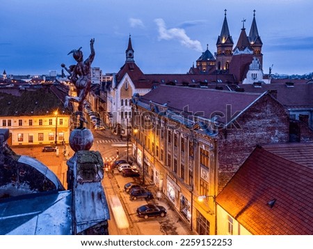 Traian Square aerial view with the surrounding baroque style buildings. Photo was taken on the 23th of January 2023 in Timisoara, the European Cultural Capital of 2023, Timis County, Romania. Royalty-Free Stock Photo #2259152253